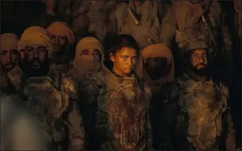  ?? PHOTOS FROM WARNER BROS. ?? Zendaya as a Fremen, one of the Indigenous desert dwellers with their own language, in a scene in “Dune: Part Two.”