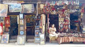  ??  ?? KALEIDOSCO­PE WORLD (clockwise from top left): The breathtaki­ng view of the city center as seen from the ancient Swayambuna­th Stupa. Incense from Nepal comes in different forms such as powders, sticks and ropes. In the known tourist district of Thamel,...