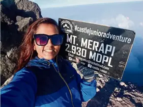  ??  ?? Kalaivaani feeling victorious at the peak of Mount Merapi in Yogyakarta, aftter an overnight hike. — KALAIVAANI P. SILVARAJAH