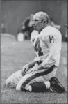  ?? DOZIER MOBLEY, THE ASSOCIATED PRESS ?? In one of the most famous sports photos ever taken, Y.A. Tittle looks dazed after being hit in a game against Pittsburgh on Sept. 20, 1964.