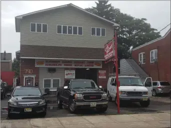  ?? ISAAC AVILUCEA - THE TRENTONIAN ?? Car Depot Sales & Service, one of two locations, was temporaril­y shuttered by city officials for refusing to renew its business license. The company has since paid the more than $4,000 in fines and fees so it could reopen.