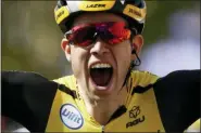  ?? THIBAULT CAMUS — THE ASSOCIATED PRESS ?? Belgium’s Wout Van Aert celebrates as he crosses the finish line to win the tenth stage of the Tour de France cycling race over 217 kilometers (135 miles) with start in Saint-Flour and finish in Albi, France, Monday.