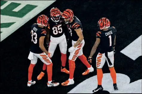 ?? Tribune News Service ?? The Cincinnati Bengals celebrate after a 75-yard touchdown reception by wide receiver Tee Higgins (85) in the third
quarter against the Los Angeles Rams in Super Bowl LVI at Sofi Stadium on Sunday, Feb. 13, 2022, in inglewood, California.