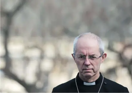  ?? CHRIS J RATCLIFFE/AFP/GETTY IMAGES FILES ?? Britain’s Archbishop of Canterbury Justin Welby, formerly an executive at Enterprise Oil and Elf Aquitaine, has unleashed criticism against tech companies including Amazon, which he accuses of leeching off tax payers and not paying living wages.