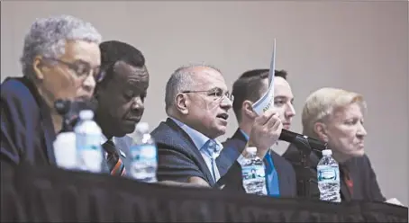  ?? ABEL URIBE/CHICAGO TRIBUNE PHOTOS ?? Gery Chico, one of 12 mayoral candidates in attendance, answers a question during the One Chicago for All Alliance forum at UIC on Saturday.