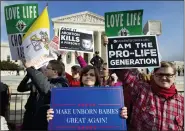  ?? JOSE LUIS MAGANA, FILE - THE ASSOCIATED PRESS ?? In this Jan. 18file photo, anti-abortion activists protest outside of the U.S. Supreme Court, during the March for Life in Washington. The number and rate of abortions across the United States have plunged to their lowest levels since the procedure became legal nationwide in 1973, according to new figures released Wednesday, Sept. 18.