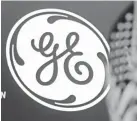 ?? RICHARD DREW/AP ?? The GE logo at the New York Stock Exchange.
