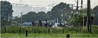  ?? VANESSA LAURIE/STUFF ?? Two people are dead and four others are badly injured after the crash on State Highway 3, Motunui.