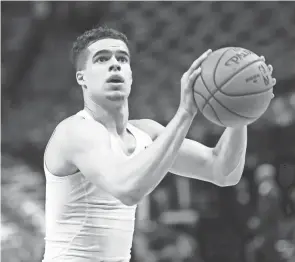  ?? KEVIN JAIRAJ/USA TODAY SPORTS ?? Nuggets forward Michael Porter Jr. warms up before a game against the Mavericks on March 11 in Dallas.