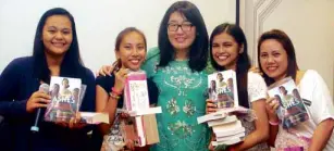  ??  ?? FANS who camped overnight at Glorietta 1 NBS to be first in line at Han’s book signing won advance copies of “Ashes to Ashes.”