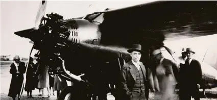  ?? Courtesy Halliburto­n Company ?? Halliburto­n founder Erle P. Halliburto­n stands in front of an airplane named “The Tester,” which the company used to service oil wells in remote areas.