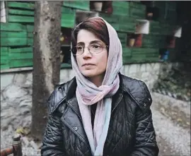  ?? Kaveh Kazemi Getty Images ?? NASRIN SOTOUDEH has defended women protesting Iran’s headscarf law. Her harsh sentence shows that Iranian authoritie­s are afraid of her, one expert said.