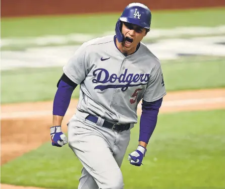  ?? TIM HEITMAN/ USA TODAY SPORTS ?? Shortstop Corey Seager helped the Dodgers punch their ticket to the World Series by hitting five home runs and being named MVP of the NLCS against the Braves in seven games.