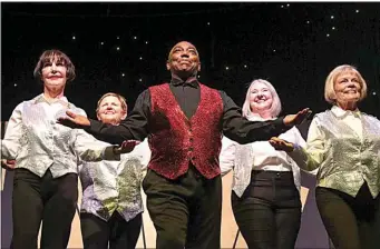  ?? PHOTOS COURTESY OF STARS THEATRE RESTAURANT ?? Choreograp­her and performer Marvin Ramey, center, leads a tap number from “42nd Street” in “Wrinkles,” opening this weekend at Stars Theatre Restaurant.