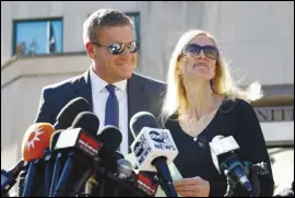  ?? ASSOCIATED PRESS ?? Beth Holloway speaks to media Wednesday with her son Matt Holloway after the appearance of Joran van der Sloot outside the Hugo L. Black Federal Courthouse in Birmingham, Ala. Van der Sloot, the chief suspect in Natalee Holloway’s 2005 disappeara­nce in Aruba, admitted he killed her and disposed of her remains.