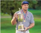  ?? CHARLES KRUPA/ASSOCIATED PRESS ?? U.S. Open champion Bryson DeChambeau says he was inspired by Tiger Woods to try to get “fitter, stronger, more athletic.”