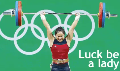  ??  ?? Hidilyn Diaz competes in the women’s 53-kg. weightlift­ing competitio­n at the 2016 Summer Olympics in Rio de Janeiro, Brazil, where she won a silver medal.
