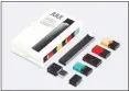  ?? JUUL LABS ?? Colorful nicotine-filled pods, pictured on the right, are inserted into the Juul e-cigarette, which educators say looks deceptivel­y like a flash drive, making it harder to identify.