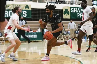  ?? ALLEN CUNNINGHAM/SUN-TIMES ?? Fenwick’s Bryce Hopkins scored 31 points and grabbed eight rebounds against Mundelein.