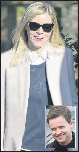  ??  ?? A beaming Ali Astall and husband Dec in London yesterday