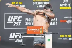  ?? Jeff Bottari Zuffa LLC ?? It wasn’t much to celebrate for Mike Perry during weigh-ins ahead of Saturday’s UFC 255 as Perry came in at four pounds over the limit.