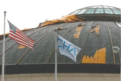  ?? STAFF PHOTO BY DOUG STRICKLAND ?? A Tuesday afternoon storm produced high winds that damaged the dome of the Chattanoog­a Metropolit­an Airport.