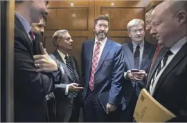  ?? Michael Reynolds EPA-EFE/REX/Shuttersto­ck ?? ANALYSES estimate California would lose $112 billion in federal aid by 2027 under the plan by Sens. Lindsey Graham, back left, and Bill Cassidy, back right.