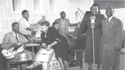  ?? PROVIDED BY BEAR FAMILY RECORDS ?? Joe Hill Louis, B.B. King and Rufus Thomas are the music stars who came out of WDIA, Memphis’ first Black radio station. But it was Willa Monroe, second from right, who broke boundaries as the first Black woman in the U.S. to host her own radio show.