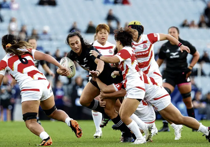  ?? PHOTO: GETTY IMAGES ?? On the attack . . . Black Ferns captain Ruahei Demant tests the Japanese defence at Eden Park on Saturday.