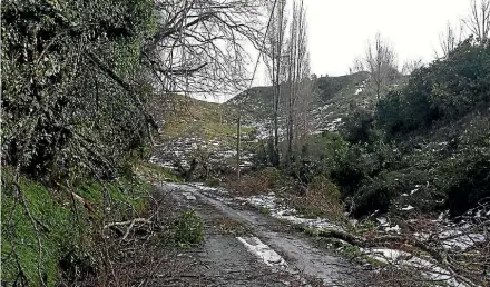  ?? PHOTO: SUPPLIED ?? Mangaweka was impassable until weather cleared enough for farmers to clear sections of the road.