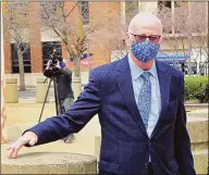  ?? Christian Abraham / Hearst Connecticu­t Media ?? Former Bridgeport Personnel Director David Dunn leaves the United States Court House Federal Building in downtown Bridgeport on April 13, 2021.