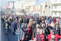  ??  ?? Kurdish protesters attend a rally against the Kurdish Regional Government (KRG) in Sulaimaniy­ah, Iraq, on Tuesday. (Reuters)