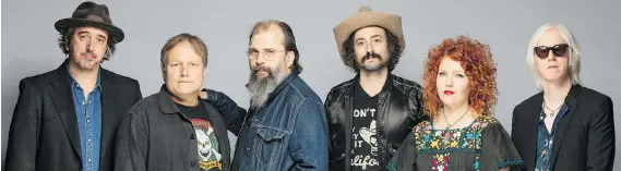  ??  ?? Steve Earle, third from left, lauds the Dukes — Brad Pemberton, left, Kelley Looney, Ricky Ray Jackson, Eleanor Whitmore and Chris Masterson — who can play music from any point in his career.