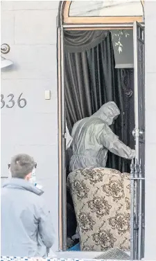  ?? Picture: BROOK MITCHELL/GETTY ?? Forensic officers examine a house in Sydney yesterday