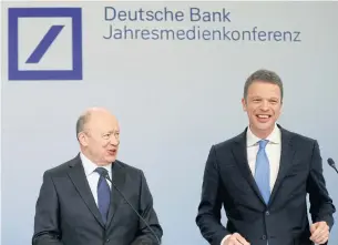  ?? REUTERS ?? John Cryan, CEO of Deutsche Bank, left, and board member Christian Sewing attend the bank’s annual news conference in Frankfurt on February 2, 2018. Sewing was appointed as new CEO late on Sunday.