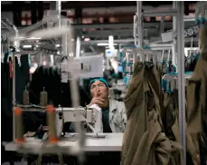  ?? EPA ?? A garment factory in China’s Jiangsu province. The World Bank expects 2024 global economic growth at 2.4 per cent