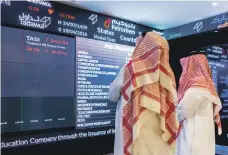  ?? Bloomberg ?? The Saudi benchmark rose to 7,902 points with Al Rajhi Bank and Sabic among the gainers