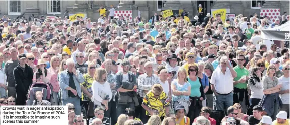  ??  ?? Crowds wait in eager anticipati­on during the Tour De France of 2014. It is impossible to imagine such scenes this summer