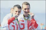  ?? PICTURE: PA ?? TAKING A THIRD BITE AT GAMES: Jonny Brownlee, left, with his silver medal and brother Alistair with gold at the Rio Olympics.