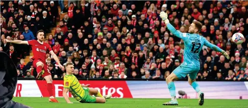  ?? REUTERS ?? Cool finish: Jota fires past Long on the half-volley to make it 3-1 to Liverpool