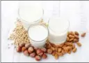  ?? DREAMSTIME ?? Non-dairy alternativ­es to milk, such as soy or nut milks, are an option for those with lactose intoleranc­e.