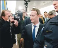  ?? AP PHOTO ?? Facebook CEO Mark Zuckerberg arrives for a meeting with Sen. John Thune, R-S.D. on Capitol Hill in Washington Monday. Zuckerberg will testify Tuesday before a joint hearing of the Commerce and Judiciary Committees about the use of Facebook data to...