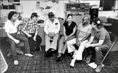  ?? John Beale/Post-Gazette ?? Co-directors Rob Toy, second from left, and Barney Oursler and other members of the Mon Valley Unemployed Committee discuss the group’s priorities during a meeting on Aug. 28, 1984, at the committee’s office in McKeesport.