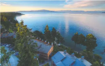  ?? PNG MERLIN ARCHIVE ?? Tigh-na-mara's resort sits above three kilometres of sandy beach and the warmest ocean swimming Canada has to offer.