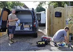  ??  ?? ON THE JOB: Locksmiths get to work securing Paul’s house