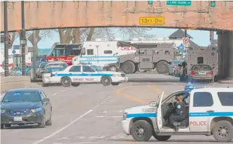  ?? | BRIAN JACKSON/SUN-TIMES ?? Chicago Police at Lake Shore Drive at Fullerton on Sunday, during a standoff with Joseph Andrew Felton Jr.