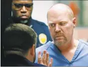  ?? Scott Utterback Courier-Journal ?? GREGORY ALAN BUSH is arraigned in the fatal shootings Wednesday at a Kentucky supermarke­t.