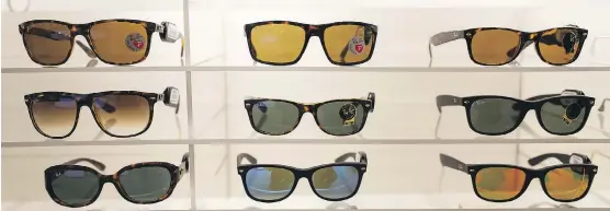  ?? CHRIS RATCLIFFE/BLOOMBERG FILES ?? Ray-Ban sunglass maker Luxottica’s expansion into lenses with its merger with Essilor is said to be attractive amid rising consumer demand.