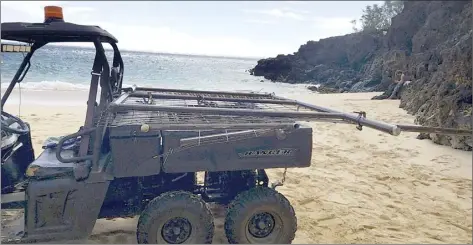  ?? State DLNR photos ?? State officials recovered metal fencing that vandals apparently cut through and tossed into the ocean at Pu‘u Ola‘i, also known as Little Beach, at Makena State Park.