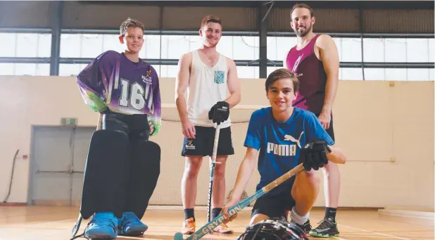  ?? Picture: STEWART McLEAN ?? ALL SET: Cairns players Brayden Naess (front), Jesse Folpp and Mitch Ivory and Queensland under-21s coach Matthew Sperring are off to the Australian Indoor Hockey Championsh­ips in Goulburn, NSW, in January. JACOB GRAMS